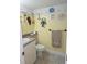 Fun bathroom featuring decor of marine animals, sink, toilet, and towel rack at 311 Garvin St # 405B, Punta Gorda, FL 33950