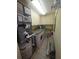 Efficient laundry room featuring cabinetry, countertop, tiled floor, washer, dryer and utilities at 311 Garvin St # 405B, Punta Gorda, FL 33950