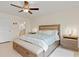 Inviting bedroom featuring a ceiling fan, stylish decor, and a comfortable bed at 3138 Darius Ave, North Port, FL 34288