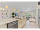 Open-concept kitchen with a large island, stainless steel appliances, and ample storage at 3138 Darius Ave, North Port, FL 34288