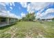 Fenced backyard features a spacious lawn at 3171 Highlands Rd, Punta Gorda, FL 33983