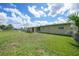 The exterior of the home features a generous fenced-in backyard at 3171 Highlands Rd, Punta Gorda, FL 33983