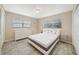 Inviting bedroom features large windows, modern bed and neutral wall paint at 3171 Highlands Rd, Punta Gorda, FL 33983