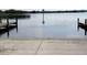 Boat ramp leading to the lake, providing direct water access for boating and recreation at 3171 Highlands Rd, Punta Gorda, FL 33983