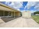 Exterior view showcasing a storage shed along the driveway of the home at 3171 Highlands Rd, Punta Gorda, FL 33983