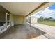 Side view of the home's exterior featuring a storage shed at the end of the driveway at 3171 Highlands Rd, Punta Gorda, FL 33983