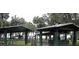Park pavilions featuring picnic tables, great for Gathering gatherings and outdoor relaxation at 3171 Highlands Rd, Punta Gorda, FL 33983