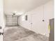 Clean garage featuring concrete floors, white walls, and ample space for parking at 37 Oakland Hills Ct, Rotonda West, FL 33947