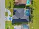 Aerial view of the home showing the roof and screened in pool at 411 Scarlet Sage, Punta Gorda, FL 33955