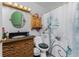 Bathroom featuring floral shower curtain and decorative vanity at 4583 S Salford Blvd, North Port, FL 34287