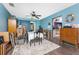 Well-lit dining room showcasing hardwood floors and ample natural light at 4583 S Salford Blvd, North Port, FL 34287