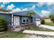 Charming home with a well-maintained front yard and colorful accents at 4583 S Salford Blvd, North Port, FL 34287