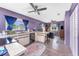 Spacious eat-in kitchen showcasing updated appliances, wooden cabinetry, and modern fixtures at 4583 S Salford Blvd, North Port, FL 34287