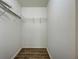 Walk-in closet with wire shelving, offering ample storage for clothing and accessories at 4609 Jaslo Ave, North Port, FL 34286