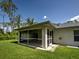 Screened lanai offers seamless indoor-outdoor living with ample space for relaxation and entertaining, plus fan at 4609 Jaslo Ave, North Port, FL 34286