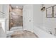 The bathroom features a tiled shower and a soaking tub for a relaxing spa-like experience after a long day at 5436 Jessamine Ave, North Port, FL 34291