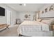Bright bedroom with a serene atmosphere, features carpet floors and neutral tones that enhances the room's appeal at 5436 Jessamine Ave, North Port, FL 34291