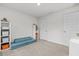 The cozy bedroom offers a comfortable and peaceful retreat, ideal for relaxation, carpet flooring, and neutral walls at 5436 Jessamine Ave, North Port, FL 34291