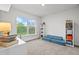 The brightly lit bedroom offers a cozy area perfect for relaxation and features plush carpet and neutral paint at 5436 Jessamine Ave, North Port, FL 34291