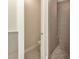 View of bathroom with a tiled shower and a separate water closet at 5451 Prime Ter, North Port, FL 34286