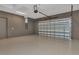 Spacious two-car garage with epoxy flooring and ample storage space at 5451 Prime Ter, North Port, FL 34286