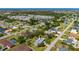 Charming neighborhood featuring mature trees and a tranquil community pond, offering a serene living environment at 611 Bonita Ct, Punta Gorda, FL 33950