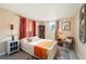 Cozy bedroom featuring a comfortable bed, warm lighting, and peaceful decor at 611 Bonita Ct, Punta Gorda, FL 33950