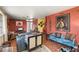 Eclectic living room with unique decor and colorful accents at 611 Bonita Ct, Punta Gorda, FL 33950