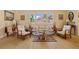 Cozy living room with neutral tones, comfortable seating, and plenty of natural light at 632 Brindisi Ct, Punta Gorda, FL 33950