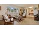 Warm and inviting living room with classic furniture, natural light, and stylish decor at 632 Brindisi Ct, Punta Gorda, FL 33950