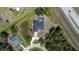 Aerial view of a residential property outlining the perimeter, house, yard, and neighborhood at 6794 Loffreda Ave, North Port, FL 34291