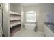 Spa-like bathroom featuring a soaking tub, separate shower, and elegant finishes at 6794 Loffreda Ave, North Port, FL 34291