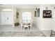 Inviting dining room with bright natural light and open access to the kitchen at 6794 Loffreda Ave, North Port, FL 34291