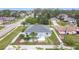 Overhead view features fenced property with a pool, offering privacy and outdoor enjoyment at 1007 Comstock St, Port Charlotte, FL 33952
