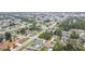 High-angle captures a charming home and community nestled among the trees at 1007 Comstock St, Port Charlotte, FL 33952