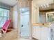 Bathroom with separate glass shower, soaking tub and vanity at 1007 Comstock St, Port Charlotte, FL 33952