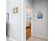 Hallway leading to a bedroom with a glimpse of hardwood floors at 1007 Comstock St, Port Charlotte, FL 33952