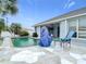 A beautiful outdoor pool area with a patio and seating is perfect for enjoying sunny days at 1007 Comstock St, Port Charlotte, FL 33952
