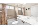 Bathroom with shower and tub, large mirror, and sink vanity for storage at 10316 Hebblewhite, Englewood, FL 34223