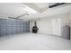 Spacious two-car garage with a grilling station, a water heater, and an automatic garage door at 10316 Hebblewhite, Englewood, FL 34223