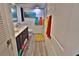 Charming bathroom featuring a double sink vanity, nautical decor, and colorful accents throughout the space at 107 Sinclair Se St, Port Charlotte, FL 33952