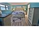 Bright bedroom with an appealing starfish theme, featuring a stylish bed frame and modern furnishings at 107 Sinclair Se St, Port Charlotte, FL 33952
