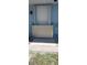 Exterior of home featuring flood barrier and door, providing security and protection against water damage at 107 Sinclair Se St, Port Charlotte, FL 33952