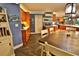 Inviting kitchen with dining area, boasting wooden cabinets, ample counter space, and tile flooring at 107 Sinclair Se St, Port Charlotte, FL 33952