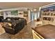 Cozy living room featuring slate floors, recessed lighting, and coastal decor at 107 Sinclair Se St, Port Charlotte, FL 33952