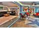 Open concept view to the living room, dining, and kitchen at 107 Sinclair Se St, Port Charlotte, FL 33952