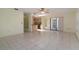 Spacious living area with tile flooring, offering seamless access to the kitchen and dining spaces at 1472 Oriel Ct, Punta Gorda, FL 33983