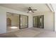 Covered patio features ceiling fan and sliding glass doors to indoor living space at 1472 Oriel Ct, Punta Gorda, FL 33983