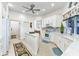 Spacious kitchen with white cabinets, granite countertops, and stainless steel appliances at 1499 Nuremberg Blvd, Punta Gorda, FL 33983