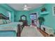 Spacious main bedroom boasts decorative tray ceiling, en-suite bathroom, natural light, and outdoor access at 1499 Nuremberg Blvd, Punta Gorda, FL 33983